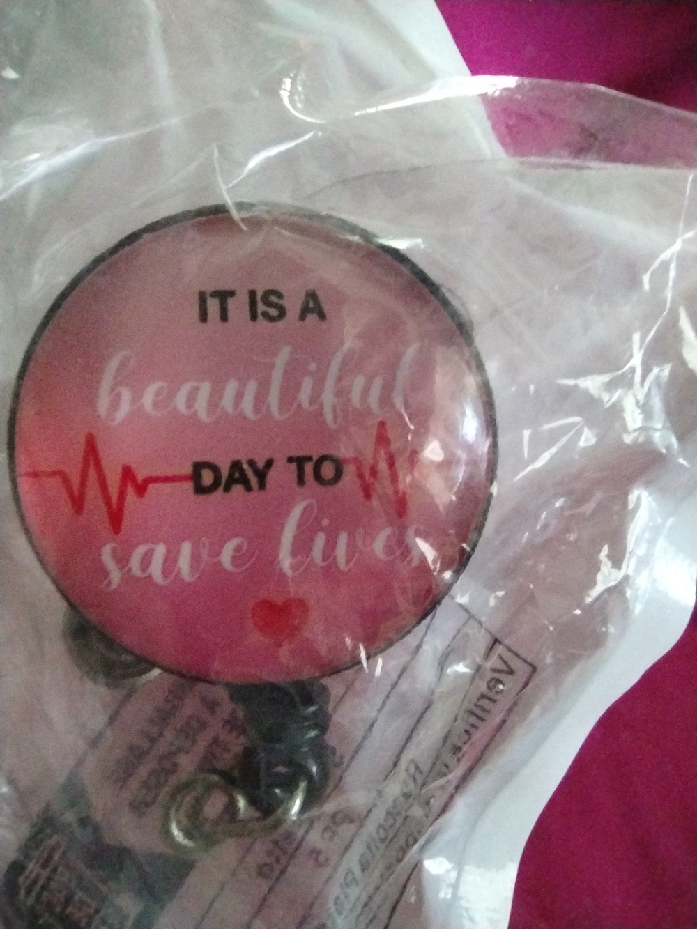 Pink 'It Is A Beautiful Day To Save Lives' Badge Reel